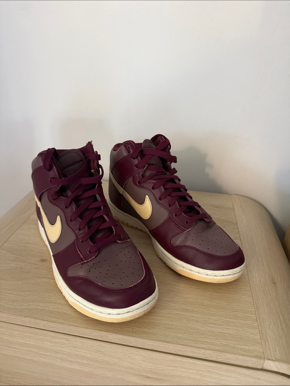 Women's Nike Burgundy High-Top Sneakers with Metallic Accent